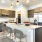 a kitchen with a table and chairs