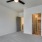 Interior view of an empty bedroom at Cadia River District Apartments in Eagle, Idaho.