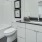 Modern Bathroom with quartz counters and white cabinets at Cadia River District in Eagle, Idaho.