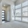 Entryway of a townhome with large windows oering natural light at Cadia River District Apartments in Eagle, Idaho.