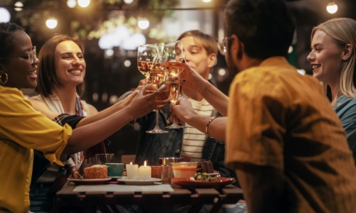 Group celebrating during a dinner at a restaurant